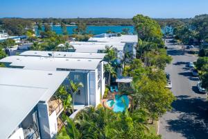 an aerial view of a resort with a body of water at Twin Quays Noosa in Noosaville