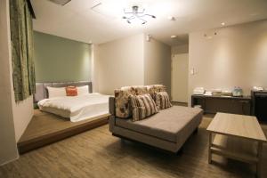 Ένα ή περισσότερα κρεβάτια σε δωμάτιο στο Sun Moon Lake Loft Inn