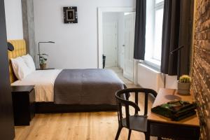Кровать или кровати в номере Soft Loft 2 Apartment