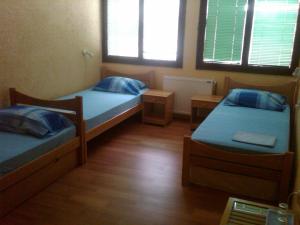 Llit o llits en una habitació de Hostel AV Palanka