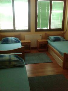 Llit o llits en una habitació de Hostel AV Palanka