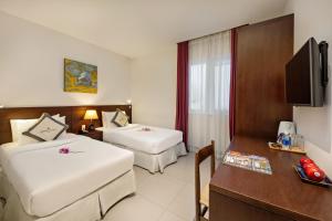 Giường trong phòng chung tại Sen Boutique Hotel