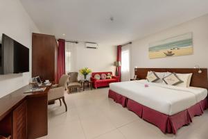 Giường trong phòng chung tại Sen Boutique Hotel