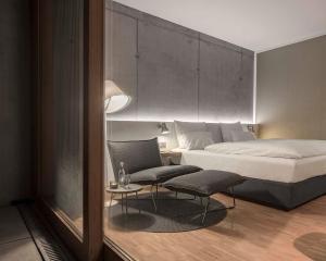 Postel nebo postele na pokoji v ubytování Factory Hotel