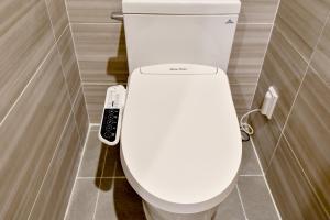 Koupelna v ubytování Blanc Business Hotel