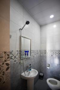 Bilik mandi di Guesthouse and Cottage Nicolo
