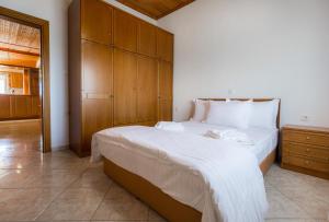 Postel nebo postele na pokoji v ubytování Filippos Hotel