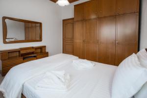 Postel nebo postele na pokoji v ubytování Filippos Hotel
