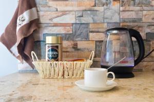 Kemudahan buat kopi dan teh di Guesthouse and Cottage Nicolo