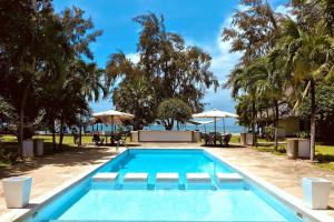 Der Swimmingpool an oder in der Nähe von Galu 723-Private Ocean Club