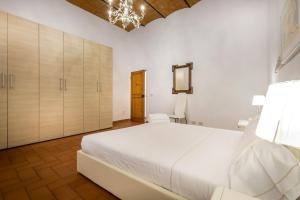 Postel nebo postele na pokoji v ubytování Pignone Apartment by Mmega