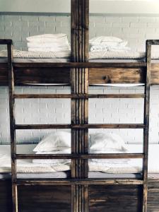 a stack of bunk beds in a room at Multi Challenge Hostel in Östersund