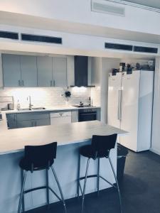 Kuchyň nebo kuchyňský kout v ubytování Multi Challenge Hostel
