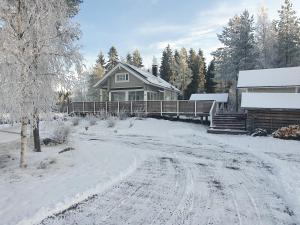 Sammalkalliontie 83 Lodge om vinteren