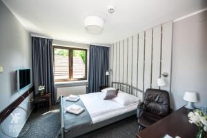 Posteľ alebo postele v izbe v ubytovaní Hotel Otomin + 37 fotografií