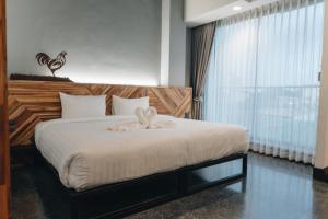 Postel nebo postele na pokoji v ubytování OU HOTEL + 22 fotografií