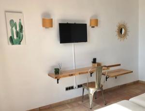 Telewizja i/lub zestaw kina domowego w obiekcie Cortijo El Paraíso