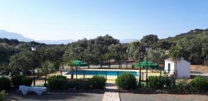 The swimming pool at or close to Las Casitas de los Cano