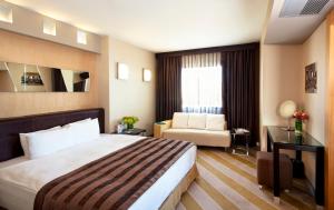 Postel nebo postele na pokoji v ubytování Point Hotel Taksim
