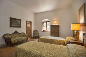 A bed or beds in a room at Malmantile by Salogi Villas