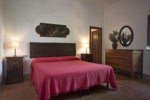 A bed or beds in a room at Malmantile by Salogi Villas