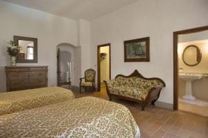 A bed or beds in a room at Malmantile by Salogi Villas