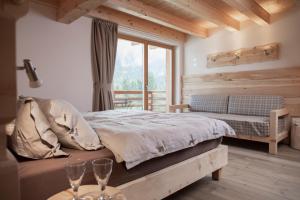 Кровать или кровати в номере Agriturismo Soreie - Farmstay