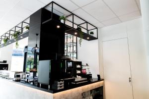 Kuchyň nebo kuchyňský kout v ubytování B&B HOTEL Zürich Wallisellen