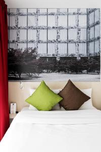 Postel nebo postele na pokoji v ubytování B&B HOTEL Zürich Wallisellen