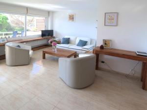 TV a/nebo společenská místnost v ubytování Urcatusa Llevant - Apartamento 6 pax con piscina g27034
