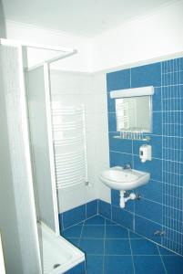 Kylpyhuone majoituspaikassa Salgó Hotel