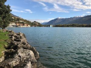 a large body of water with mountains in the background at Casa Marconi in Lovere