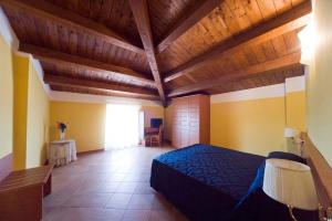 Postel nebo postele na pokoji v ubytování Hotel Palazzo Bruni
