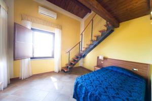 Postel nebo postele na pokoji v ubytování Hotel Palazzo Bruni