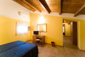 Postel nebo postele na pokoji v ubytování Hotel Palazzo Bruni