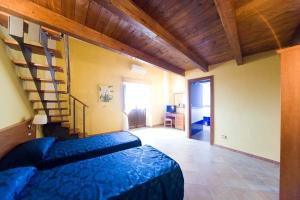 Postel nebo postele na pokoji v ubytování Hotel Palazzo Bruni