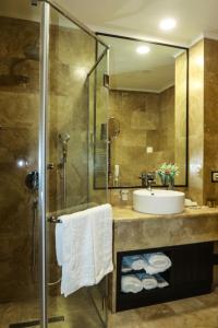 Vannituba majutusasutuses Konyak Hotel
