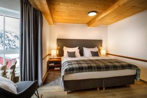 Ένα ή περισσότερα κρεβάτια σε δωμάτιο στο VALAMAR Obertauern