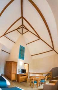Coin salon dans l'établissement B&B Ferme Château de Laneffe