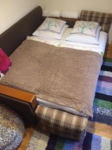 Postel nebo postele na pokoji v ubytování Апартаменты PAROSTKI