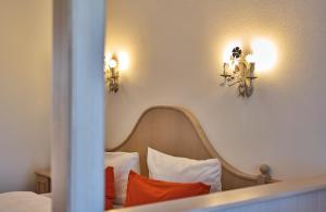 Postel nebo postele na pokoji v ubytování Hotel Eisensteiner Hof
