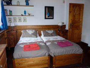 Letto o letti in una camera di Mansarda in chalet a Cortina