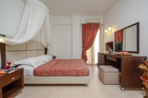 Posteľ alebo postele v izbe v ubytovaní Aeolis Boutique Hotel