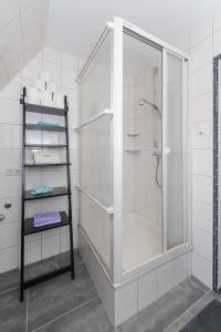 Ванна кімната в Ferienhaus Leevje