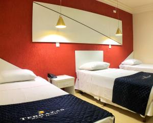 Cama ou camas em um quarto em Terrazas Hotel