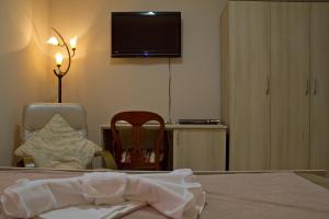 Letto o letti in una camera di Garni Hotel Tri O