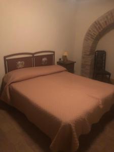 מיטה או מיטות בחדר ב-Agriturismo Piandellerose