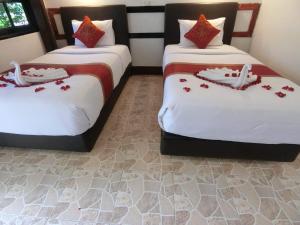 Кровать или кровати в номере The Krabi Forest Homestay