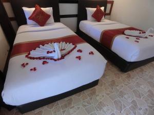 Кровать или кровати в номере The Krabi Forest Homestay