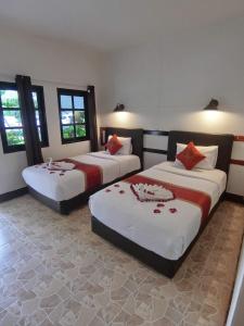 Кровать или кровати в номере The Krabi Forest Homestay